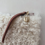 Curlicue Shearling and Leather Pouches