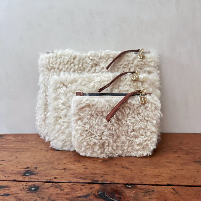 Curlicue Shearling and Leather Pouches